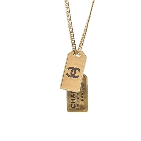 coco chanel dog necklace.